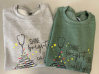 Scrub Box Shine Bright like a Call Light — women's scrub | ScrubBox